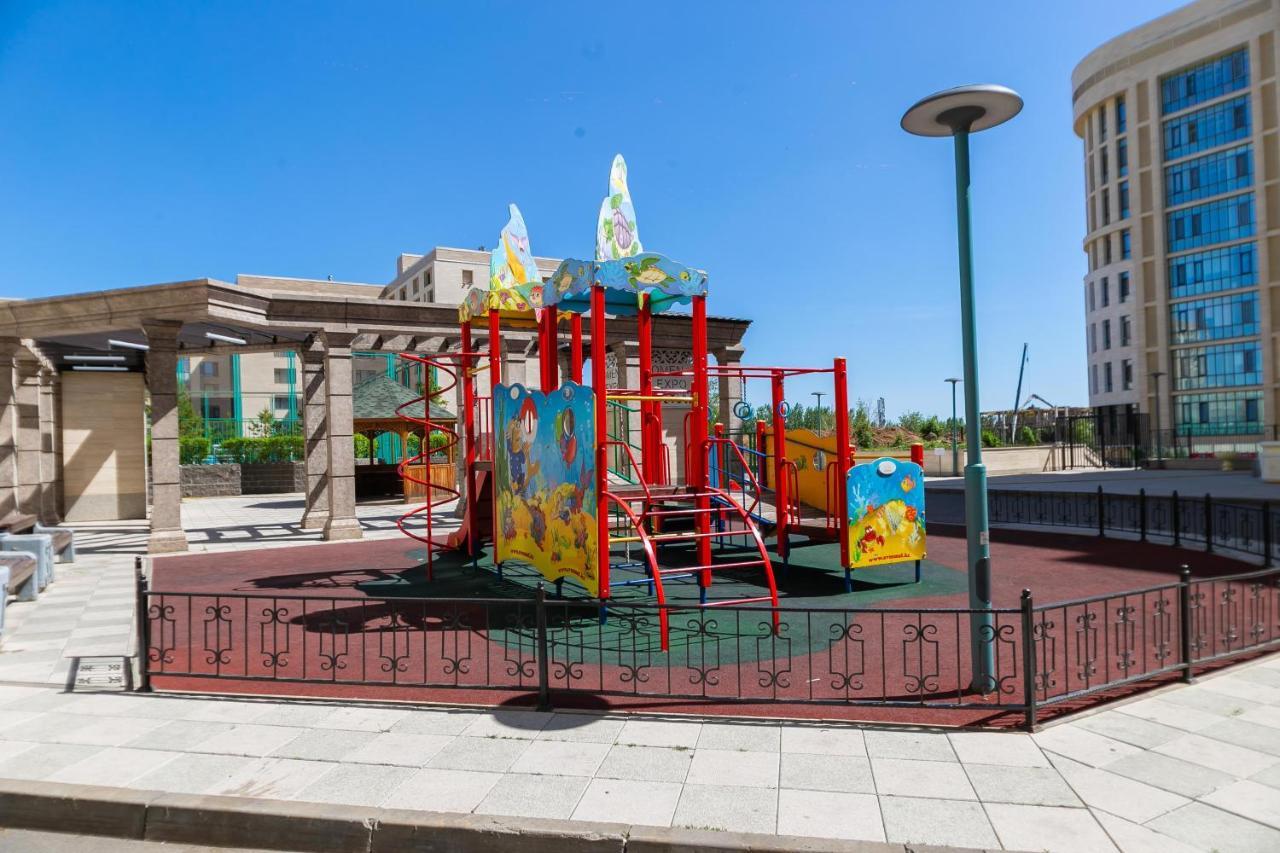 В Promenade Expo Квартира С Романтическим Видом Astana Exterior foto